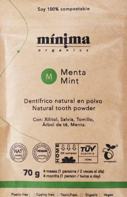 Natürliches Zahnpulver mit Minze in kompostierbarer Papiertüte