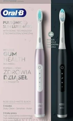 Set aus elektrischen Zahnbürsten, rosa und schwarz